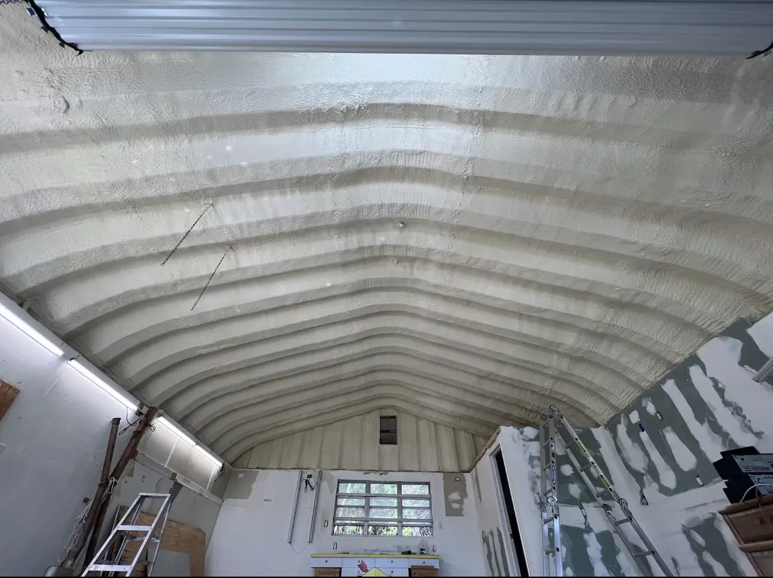 Spray polyurethane foam applied to the underside of a metal roof deck in Larkfield-Wikiup